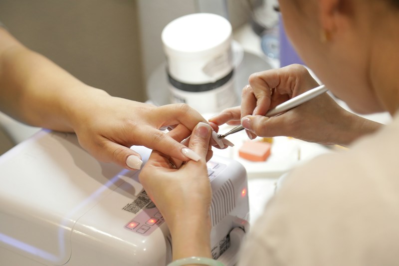 Manicure nail polishing detail